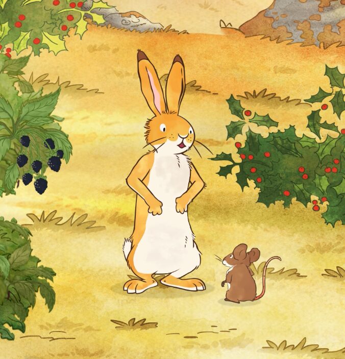 A cartoon rabbit and mouse stand in a grassy field surrounded by holly bushes and blackberry plants. The rabbit is tall with long ears, while the mouse is small, looking up at the rabbit. The setting is a sunny day with foliage in the background.