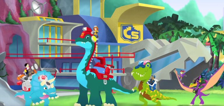 Animated dinosaurs in a colorful forest with a modern building in the background. A blue Brachiosaurus, green T-Rex, orange Pterodactyl, and a blue Triceratops wear gear and hats, with small humans riding or interacting with them.